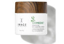 Skincare cream jar with wooden cap on a white background