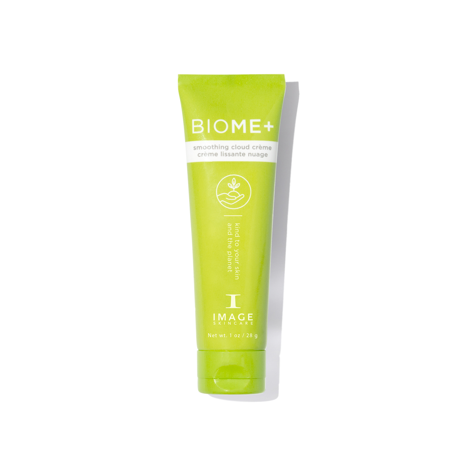 Green tube of BIOME+ cream on a white background